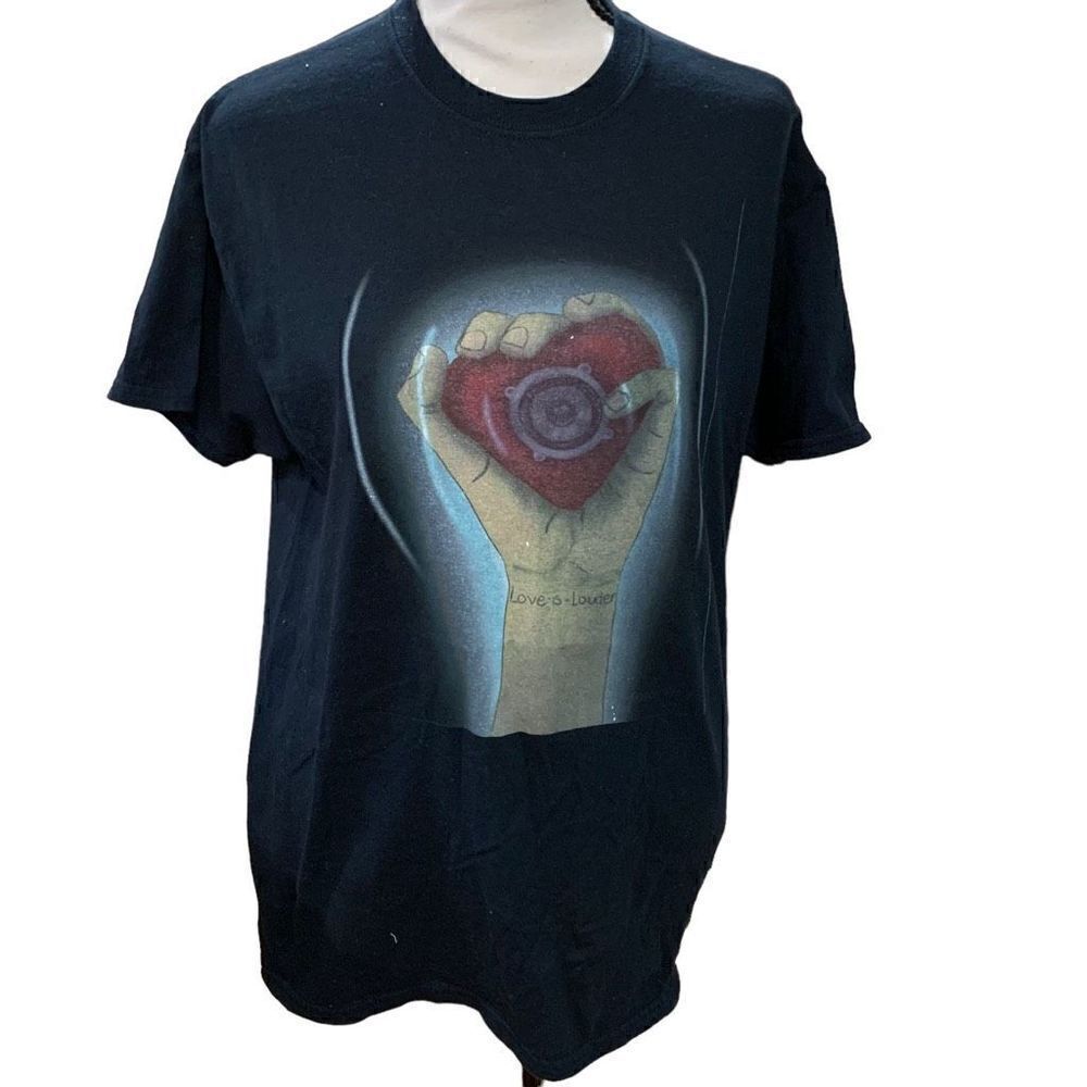 Love is Louder Heart in Hand Graphic T-Shirt‎